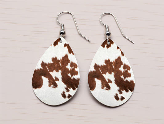 Conjunto de aretes de piel de vaca bovina parcheada